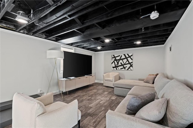 living room with baseboards and wood finished floors