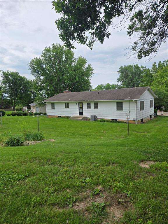 2213 Millwood Dr, Atchison, KS 66002 - rear view of house with a yard and crawl space