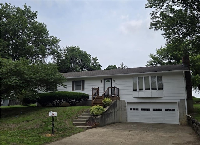 2213 Millwood Dr, Atchison, KS 66002 - ranch-style home with a garage, a chimney, and concrete driveway
