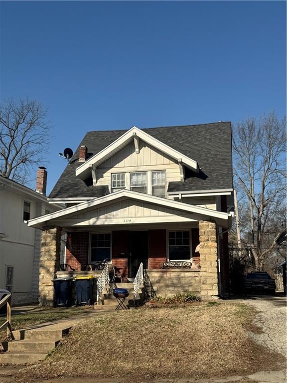 view of front of home with covered porch and board and batten siding