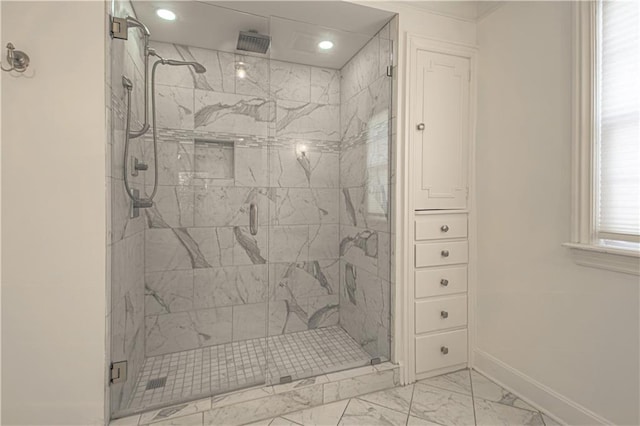 full bathroom with recessed lighting, baseboards, marble finish floor, and a stall shower