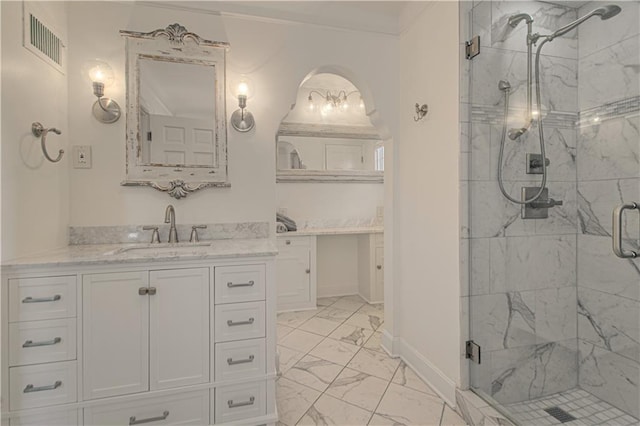 bathroom featuring a marble finish shower, visible vents, baseboards, marble finish floor, and vanity