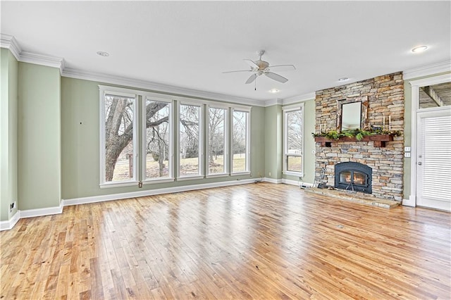 unfurnished living room with a fireplace, wood finished floors, a ceiling fan, and ornamental molding