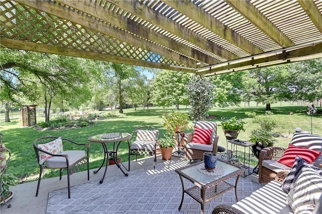 view of patio with outdoor lounge area and a pergola