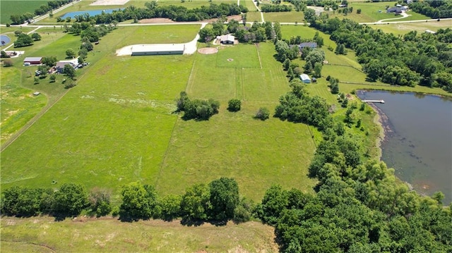 bird's eye view featuring a rural view and a water view