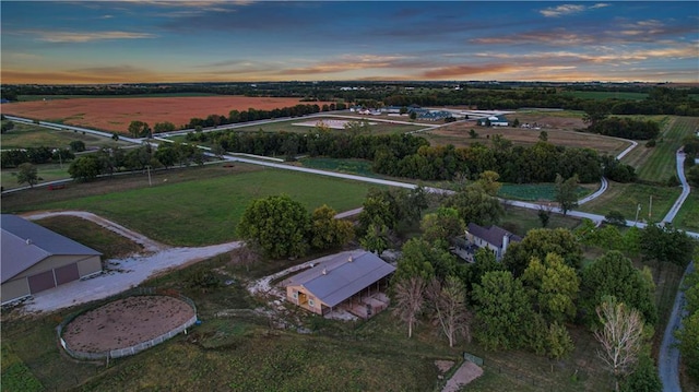 aerial view at dusk with a rural view