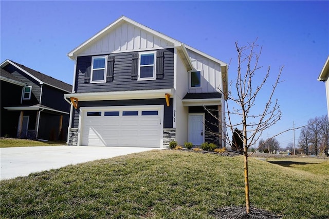 view of front facade with stone siding, board and batten siding, concrete driveway, a front yard, and an attached garage