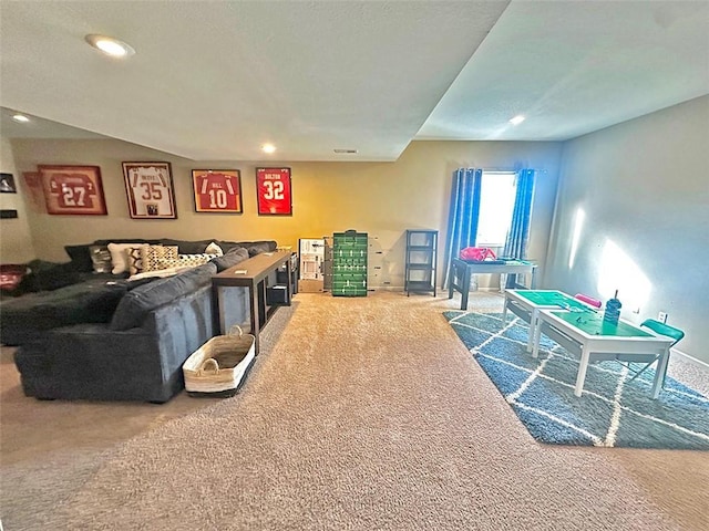 carpeted living room featuring recessed lighting and baseboards