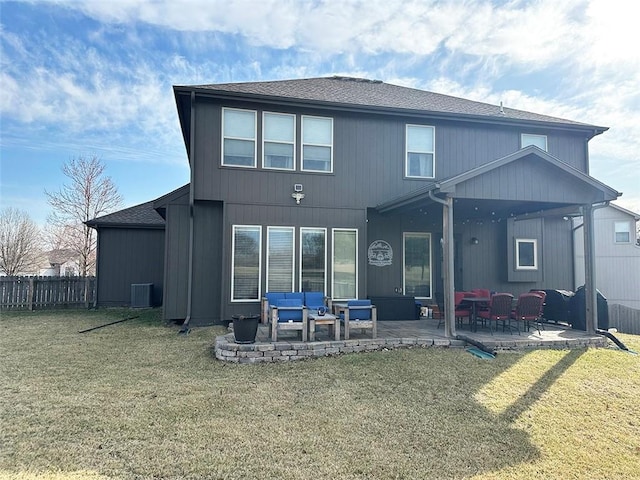 rear view of house featuring a yard, a patio, central air condition unit, and fence