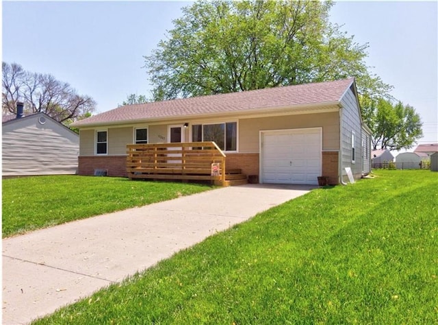 ranch-style house with brick siding, an attached garage, driveway, and a front yard