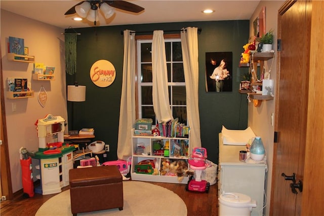 playroom with recessed lighting, wood finished floors, and a ceiling fan