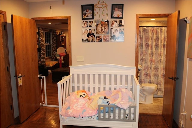 bedroom featuring hardwood / wood-style flooring