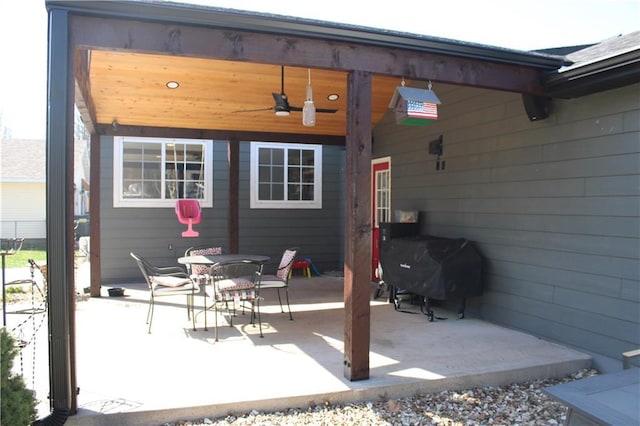 view of patio featuring ceiling fan and grilling area