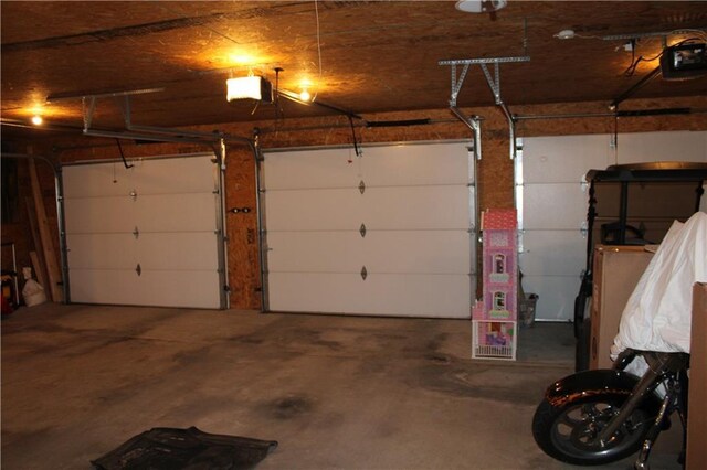 garage featuring a garage door opener