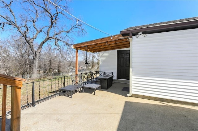 view of patio / terrace with fence