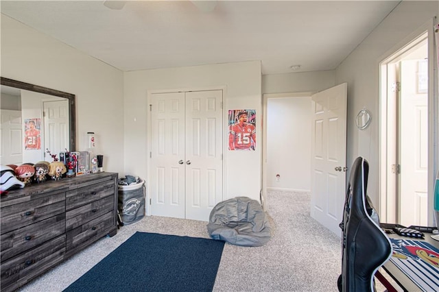 bedroom featuring a closet and carpet