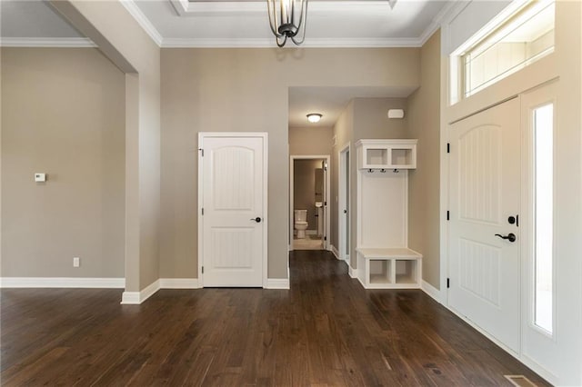 foyer featuring a wealth of natural light, baseboards, dark wood-style flooring, and crown molding