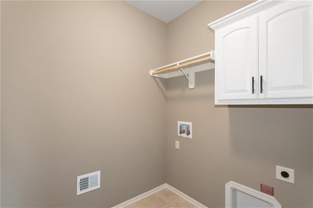 washroom with visible vents, baseboards, washer hookup, cabinet space, and hookup for an electric dryer