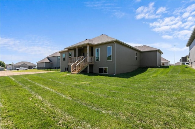 exterior space featuring a front yard and stairway