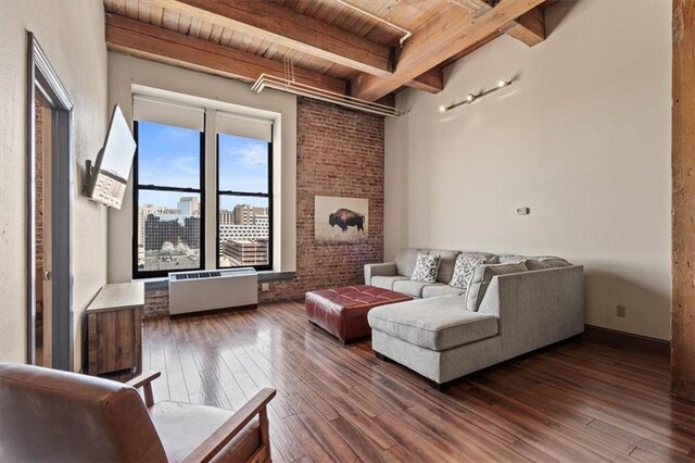308 W 8th St Unit 414, Kansas City, MO 64105 - living room featuring a wood ceiling with exposed beams and wood finished floors