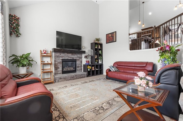 carpeted living room with a fireplace