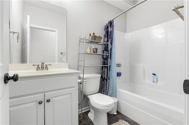 bathroom featuring vanity, toilet, and shower / tub combo