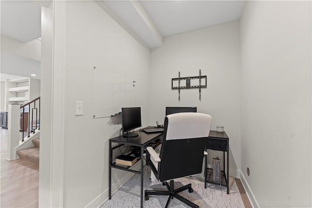 office with baseboards and wood finished floors