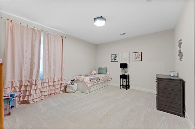 bedroom featuring baseboards