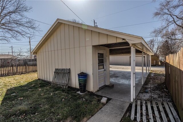 garage with fence