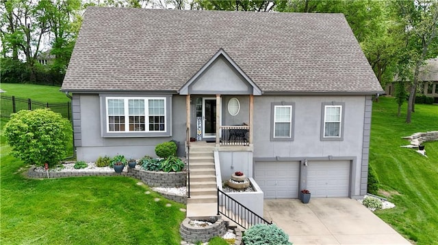 11705 E 86th Ter, Raytown, MO 64138 - view of front of property with stucco siding, roof with shingles, concrete driveway, and a garage
