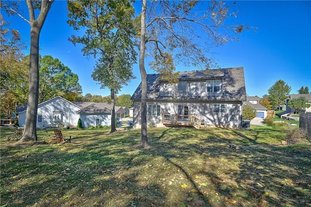 11705 E 86th Ter, Raytown, MO 64138 - back of house with a wooden deck and a yard