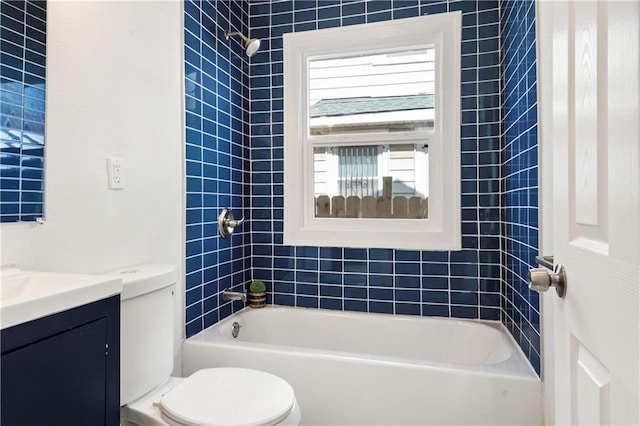 full bathroom featuring toilet, vanity, and shower / tub combination