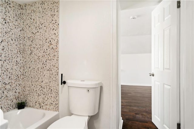 bathroom featuring toilet and wood finished floors