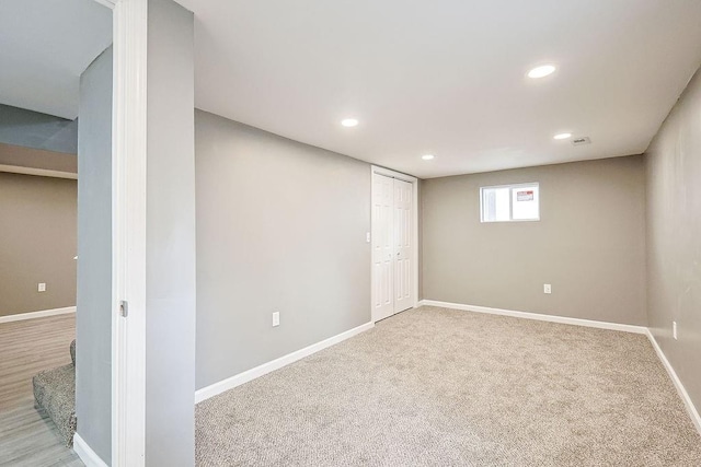 basement with recessed lighting, visible vents, baseboards, and carpet floors