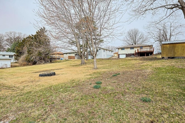 view of yard with a wooden deck