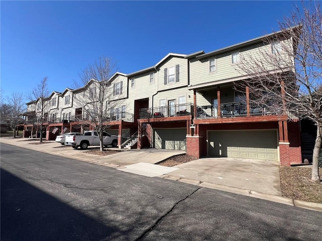 view of front of home with an attached garage and driveway