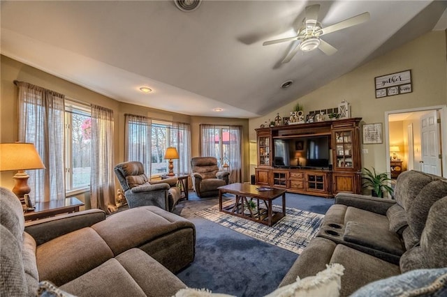 living room with carpet flooring, ceiling fan, and vaulted ceiling