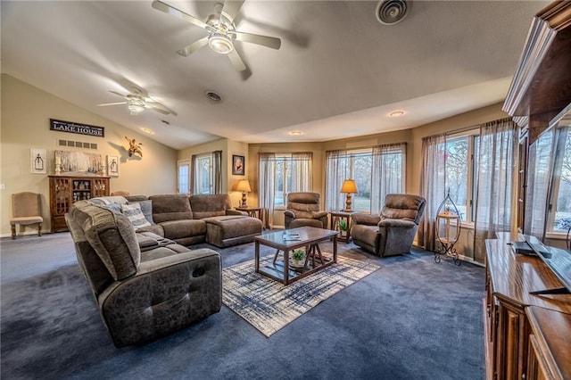 living area with lofted ceiling, carpet flooring, and visible vents