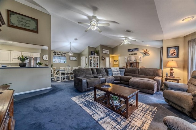 living area featuring dark carpet, baseboards, a ceiling fan, and vaulted ceiling