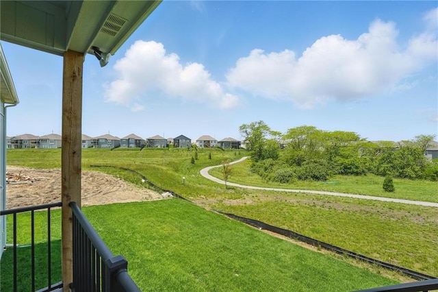 1518 NW 106th Ter, Kansas City, MO 64155 - view of green lawn with a residential view