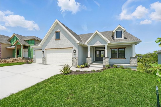 1518 NW 106th Ter, Kansas City, MO 64155 - craftsman house featuring a front yard, stucco siding, concrete driveway, stone siding, and french doors