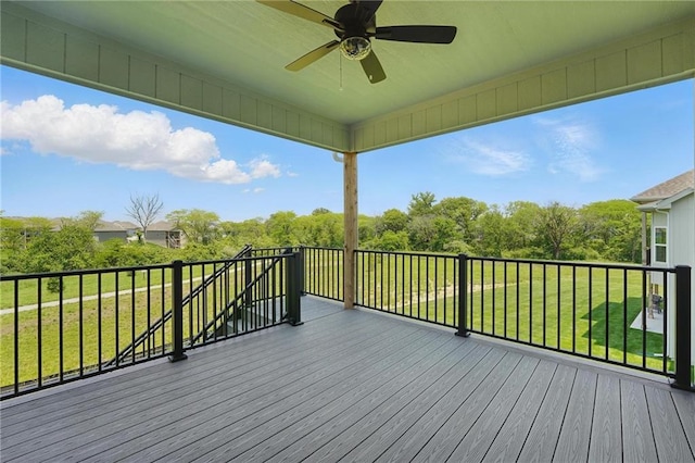 1518 NW 106th Ter, Kansas City, MO 64155 - wooden terrace featuring ceiling fan and a lawn
