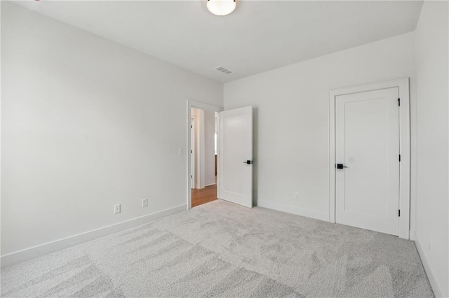 1518 NW 106th Ter, Kansas City, MO 64155 - unfurnished bedroom with carpet floors and baseboards