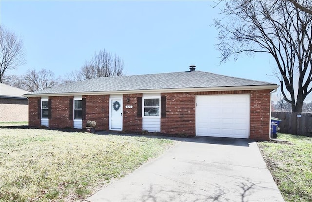 single story home with a front yard, concrete driveway, fence, and a garage