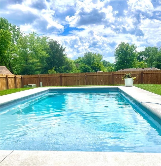 view of swimming pool featuring a fenced in pool and a fenced backyard