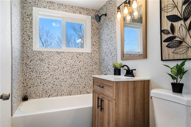 full bathroom featuring vanity, an inviting chandelier, and toilet