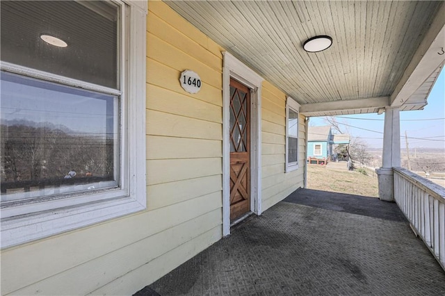 view of patio featuring a porch