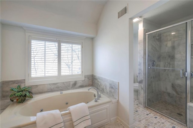 full bath featuring visible vents, toilet, a jetted tub, and a stall shower