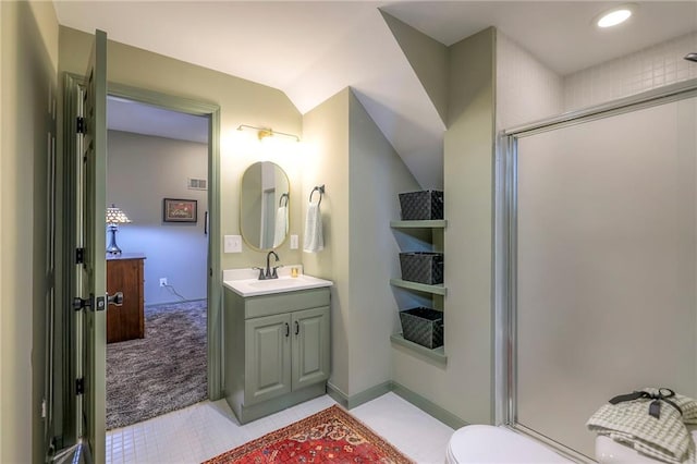 full bathroom with vanity, vaulted ceiling, visible vents, and a shower with shower door