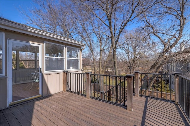 deck with a sunroom